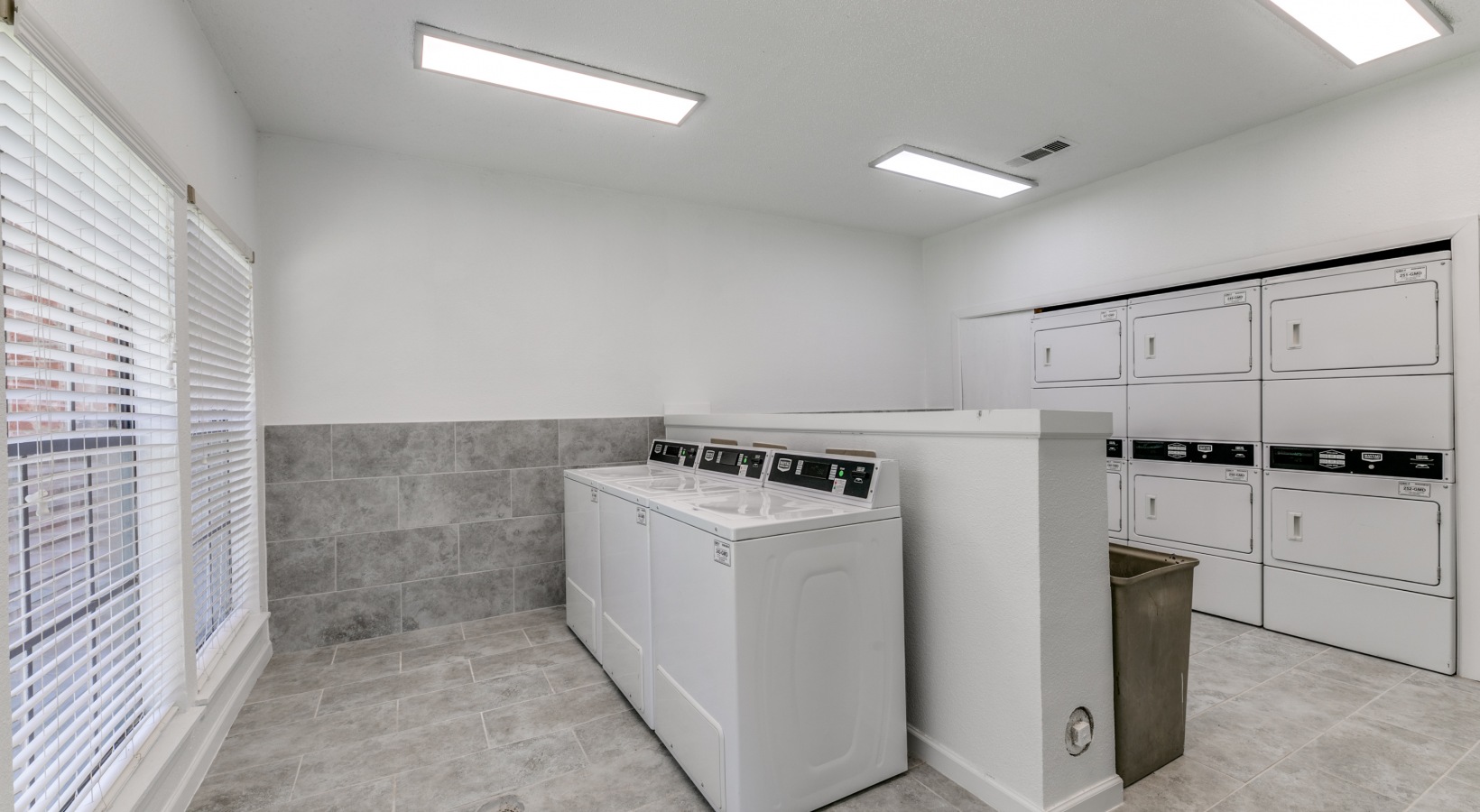 a laundry room with washer and dryer in it at The  Dayton